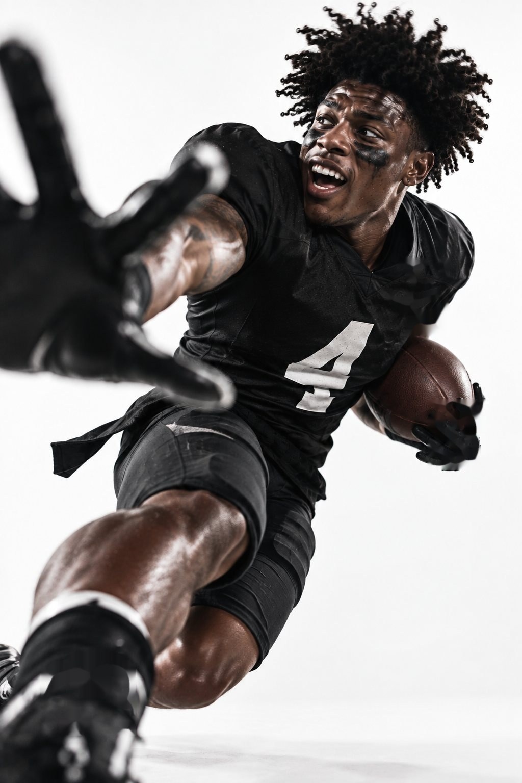 Football player running with the ball, arm stretched toward the camera